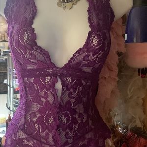 lace v cut teddy  thong back  halter neck  this is a stretchy outfit fits